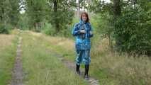 Miss Petra goes for a walk in PVC raingear and rubber boots