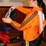 Jill wearing a sexy black nylon shorts and a orange rain jacket while dressing her up (Pics)
