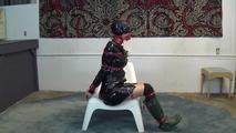 Ana in shiny raincoat bondage