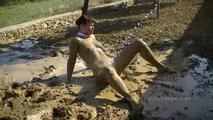 Naked in the mud