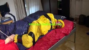 Get 2 Archivevideos with sonja enjoying Bondage in her shiny nylon Rainwear