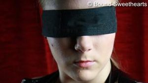 Ginger bound in lack with handcuffes