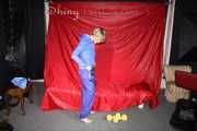 Watching sexy Sonja wearing a supersexy oldschool blue shiny nylon shorts and a lightblue rain jacket during her workout with barbells (Pics)