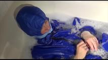 Sonja taking a bath and ties and gagges herself wearing a shiny nylon rainwear combination (Video)