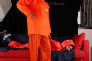Julia tied and gagged by Alina in heavy raingear