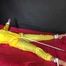 Watching sexy Pia being tied and gagged with ropes on a bed and a clothgag wearing sexy yellow shiny nylon rainwear (Video)