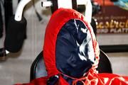 Katharina tied and gagged in shiny nylon rainwear