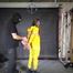 Marie tied and gagged in shiny nylon rainwear