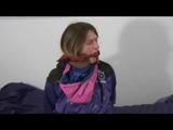 02:50 Min. video with Katharina tied and gagged in shiny nylon clothes