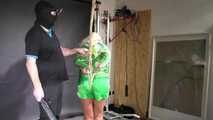 Alice bound and gagged in shiny nylon Shorts and Rainjacket