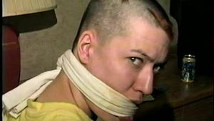 PUNK GIRL MELA IS CLEAVE GAGGED, BAREFOOT, TOE-TIED & TIED TO A CHAIR WEARING BLUE JEAN SHORTS (D63-7)