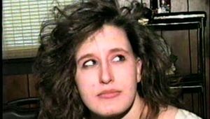 24 YEAR OLD ERICA IS MOUTH STUFFED, CLEAVE GAGGED, ROPE GAGGED & BALL-TIED WITH BLACK ELECTRICAL TAPE ON THE FLOOR (D51-16)