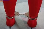 Angie in cuffs