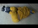 03:20 Min. video with Katharina bound in a yellow rainsuit