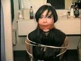 30 YR OLD ASIAN LI-JUN IS CLEAVE GAGGED, TIED TO CHAIR, LOTS OF WIDE EYED GAG TALKING (D52-11)