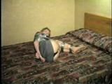 Flight Attendant, Ball-Tied & Wrap Gagged With Duct Tape (D23-4)