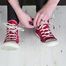 Nikki loves her red Converse high-tops