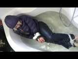 Get 3 Videos with Jenny bound and gagged in shiny nylon Downwear from 2008