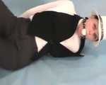Dressed up Rozanka in a fantastic bondage session (video)