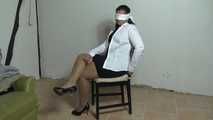 Jasmin roped to chair 1/2