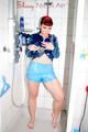 Watching Jill during taking a shower in an oldschool lightblue shiny nylon shorts and a blue rainjacket (Pics)