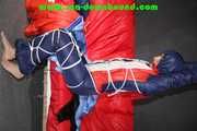 Sexy Sonja wearing a sexy oldschool shiny nylon downbib and donjacket being tied and gagged with ropes overhead (Pics)