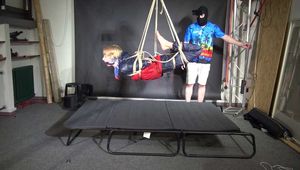 Watch Myxxxy bound and suspended in shiny nylon Rainwear