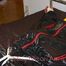 Lucy tied and gagged in a bed wearing a black shiny nylon downwear combination (Pics)