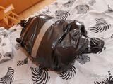 [From archive] Dominica Phoenix - ball taped and packed in trash bag