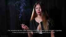 Irina is giving an interview while smoking 