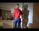 Watch Sonja to dress herself with rainwear and begin her workout on the home trainer (Video)