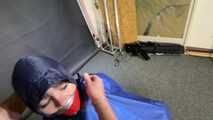 Lana bound and gagged in shiny nylon Rainwear