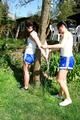 Jill tied and gagged by her friend in shiny nylon shorts