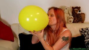 inflating and stretching some 12inch and 14inch balloons with one accicent pop [mostly NonPop]