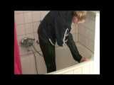 Get 2 Videos of a nice woman from our 2008 Archive enjoying her shiny nylon Rainwear at home