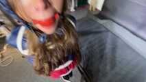 Marie bound and gagged in shiny nylon Rainwear