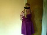 Miri is cuffed up and blindfolded