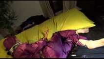 Get 2 Archivevideos with sonja enjoying Bondage in her shiny nylon Rainwear