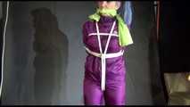 MARA tied and gagged overhead with ropes and a cloth gag wearing a super sexy super shiny purple rainsuit and blue rubber boots (Video)