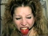 TAMARA IS TIGHTLY BALL-GAGGED, TIT TIED & DROOLS WHILE SITTING TIED TO A CHAIR (D48-12)