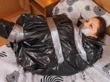[From archive] Dominica Phoenix - ball taped and packed in trash bag
