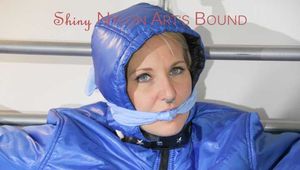 Mara tied, gagged and hooded on a bed wearing a sexy oldschool downwear (Pics)