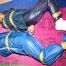Stella and Leonie tied and gagged and hooded with tape both wearing sexy shiny nylon rainwear (Pics)