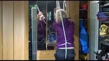Pia tied with ropes overhead and gagged with a ballgag wearing sexy rain pants and a rain jacket (Video)
