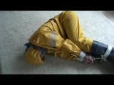 03:20 Min. video with Katharina bound in a yellow rainsuit