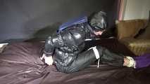 Ronja being tied and gagged with ropes and a ballgag in shiny nylon rainwear and downwear (Video)