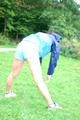 Enni wearing sexy blue shiny nylon shorts and rainjacket during her warm-up (Pics)