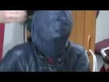 03:20 Min. video with Jill tied and gagged in shiny nylon rainwear