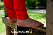 Barefoot girl on the playground