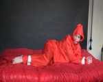 Get 3 Archive Videos with nice young women enjoying Bondage in shiny nylon Rainwear from 2008.